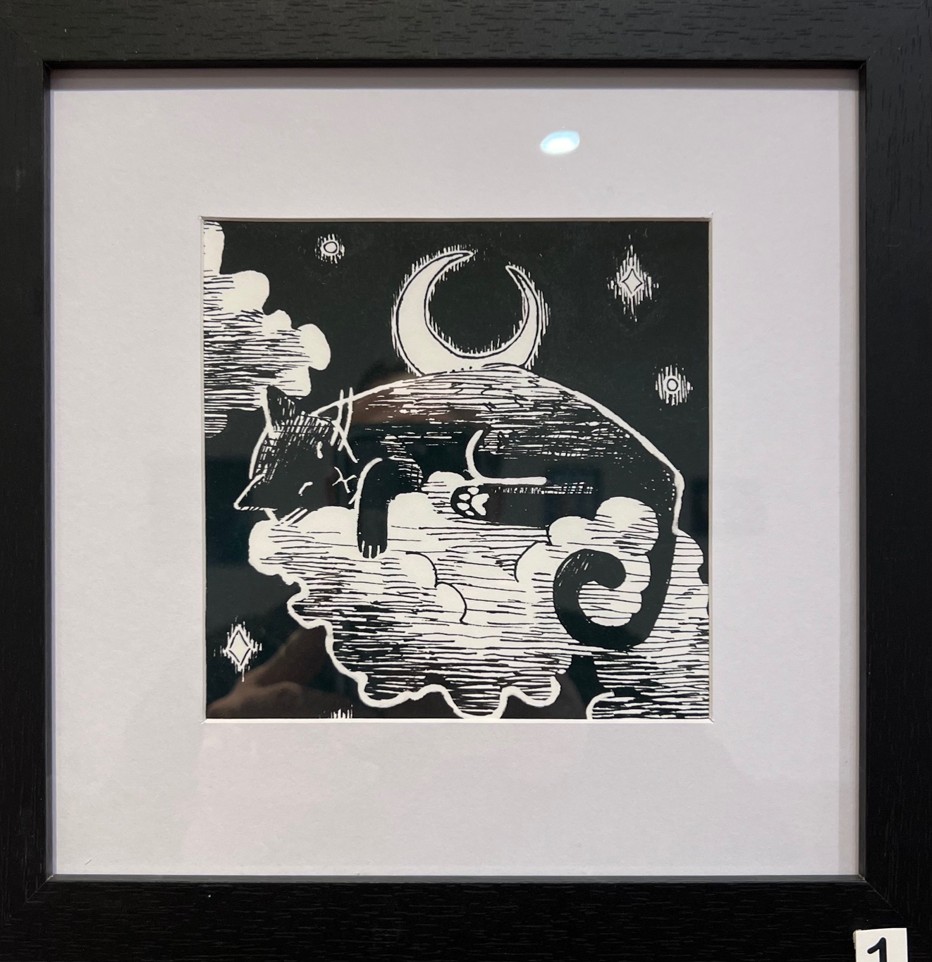 Inktober sketch of a cat sleeping on a cloud with a crescent moon in the background