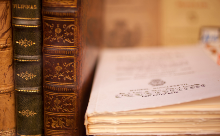 A stack of vintage books.