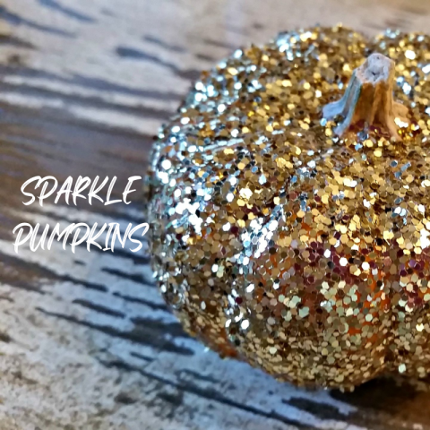 A pumpkin covered in gold sequins.