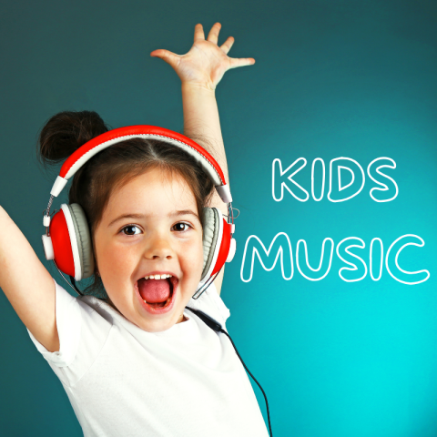 A child with over ear headphones one, smiling with their hands in the air.