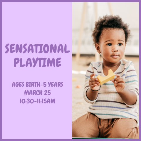 A toddler playing with a wooden block.