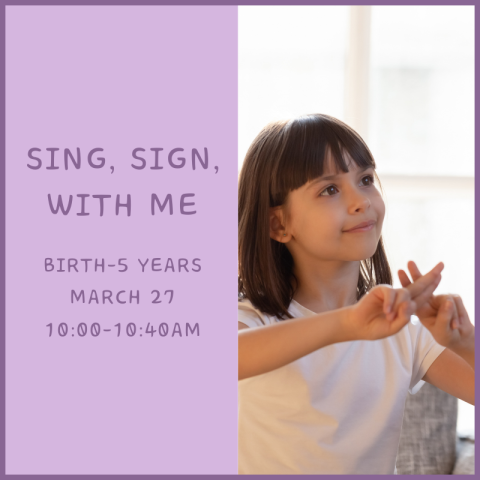 A child speaking in sign language.