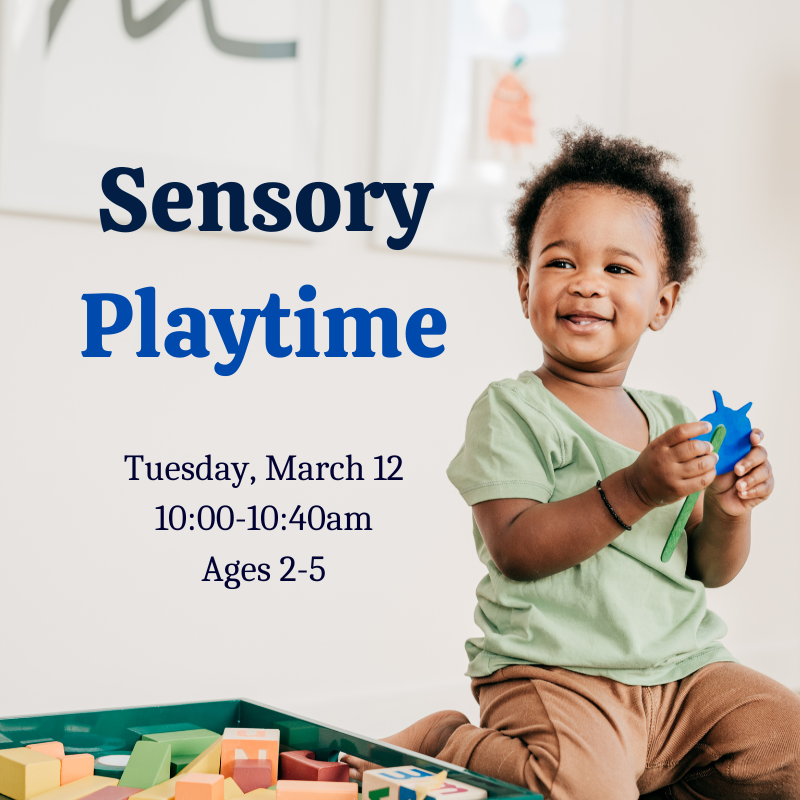 A child playing with blocks and other toys.