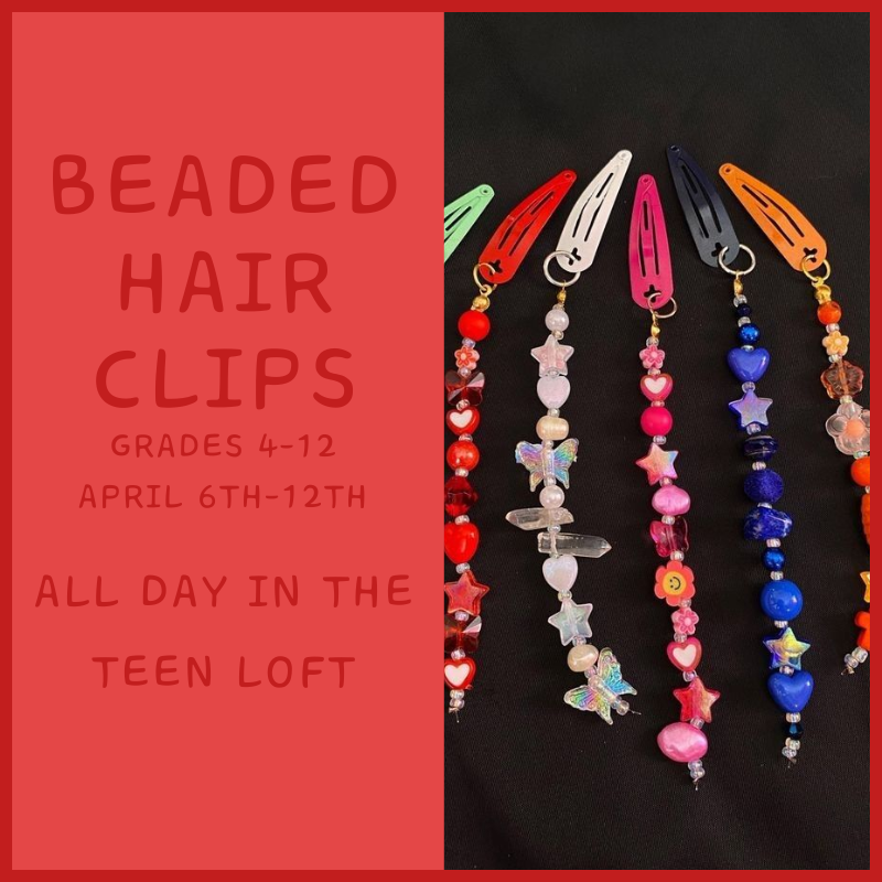 Barrette clips with a string of beads attached.