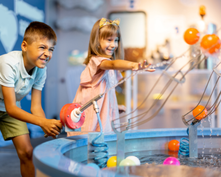 Two children enjoying a museum activity